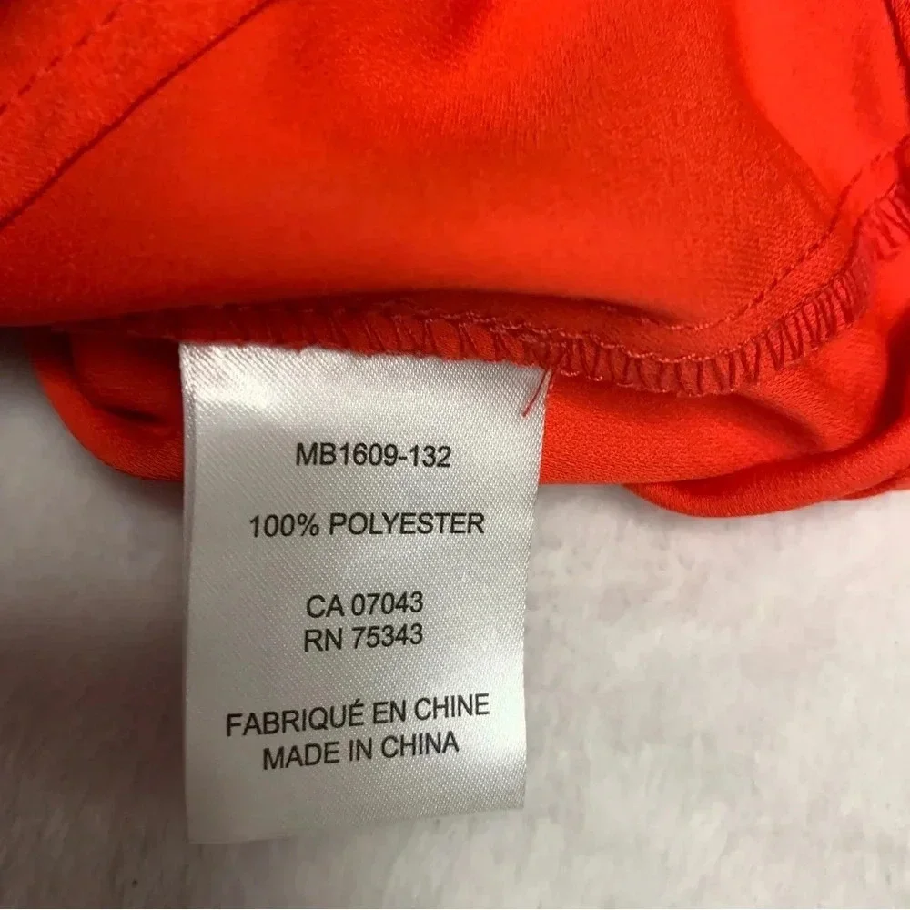 Rachel Zoe bright orange blouse size Small bold seam down the front